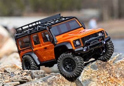 97054-1-TRX4m-Defender-Action-Orange-3qtr-Front-Rock-Crawl-3797