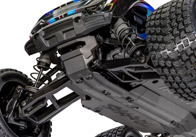 טרקסס מיני XRT מוכנה לנסיעה - בראשלס 4X4 בגודל 1/16 בצבע כתום (ללא סוללה ומטען )