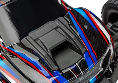 טרקסס מיני XRT מוכנה לנסיעה - בראשלס 4X4 בגודל 1/16 בצבע כתום (ללא סוללה ומטען )