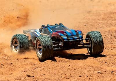 67076-4-Rustler-4x4-VXL-Action-Dirt-BLUE-5095